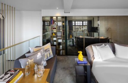 W Amsterdam gay-friendly hotel room. Modern design, stylish decor, and luxurious amenities. Perfect for gay travelers visiting Amsterdam.
