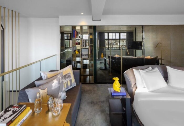 W Amsterdam gay-friendly hotel room. Modern design, stylish decor, and luxurious amenities. Perfect for gay travelers visiting Amsterdam.