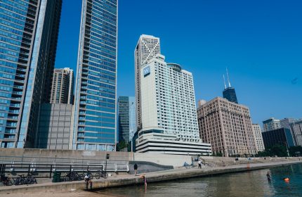 W Chicago Lakeshore, a gay-friendly hotel. Chicago skyline view from the lakefront, showing high-rise buildings on a clear day.