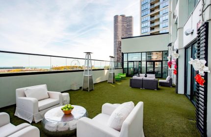 W Chicago Lakeshore gay-friendly hotel rooftop lounge. Outdoor seating, city views, and modern design. A stylish space for LGBTQ+ travelers.