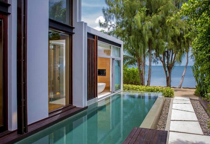 W Koh Samui's gay-friendly, pet-friendly villa with pool. Ocean view from the modern room with a bathtub. Tropical luxury for gay travelers.