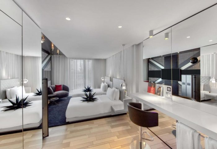 W London Leicester Square gay-friendly hotel room. Modern design, two beds, Union Jack detail. Pet-friendly stay in central London.