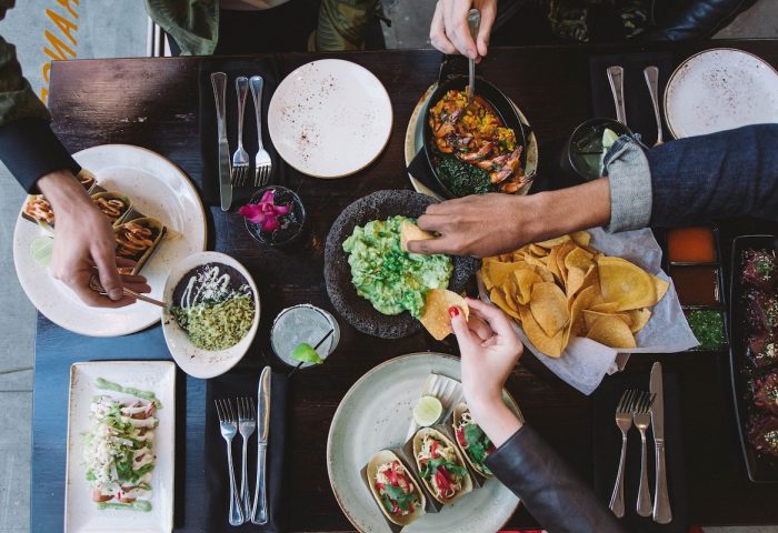 W New York Times Square gay-friendly hotel: Overhead shot of a table laden with delicious food like tacos, guacamole, and shrimp.