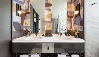 W New York Union Square gay-friendly hotel bathroom. Double sink vanity, modern design, and stylish decor. Upscale hotel for gay travelers.