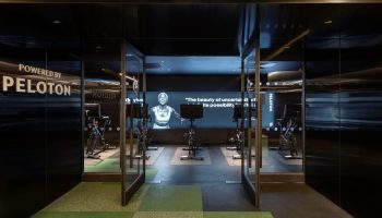 W New York Union Square gay-friendly hotel Peloton gym. Fitness center at this upscale hotel. Exercise bikes and motivational screen.