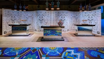 W Punta de Mita's chic lobby. This gay-friendly hotel boasts stylish decor, including mosaic floors, patterned screens, and mirrored desks.