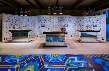 W Punta de Mita's chic lobby. This gay-friendly hotel boasts stylish decor, including mosaic floors, patterned screens, and mirrored desks.