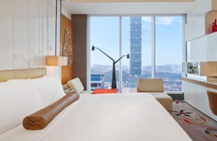 W Taipei gay-friendly hotel room with a view of Taipei 101. Modern design, bright, spacious. Ideal for gay travelers seeking luxury.