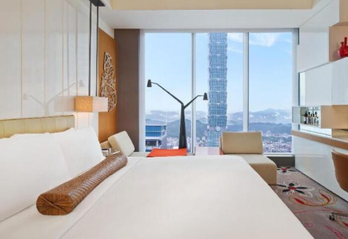 W Taipei gay-friendly hotel room with a view of Taipei 101. Modern design, bright, spacious. Ideal for gay travelers seeking luxury.