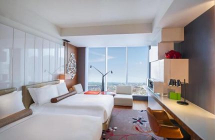 Gay-Friendly W Taipei hotel room. Modern design, twin beds, city view. A top choice for gay travel in Taipei, Taiwan. Stylish and welcoming.