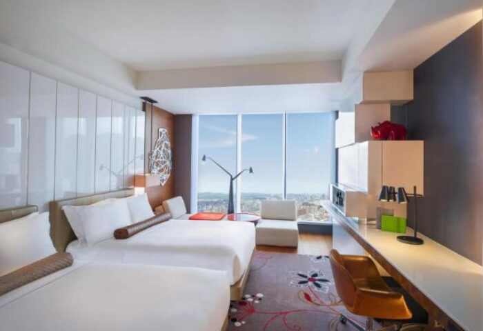 Gay-Friendly W Taipei hotel room. Modern design, twin beds, city view. A top choice for gay travel in Taipei, Taiwan. Stylish and welcoming.