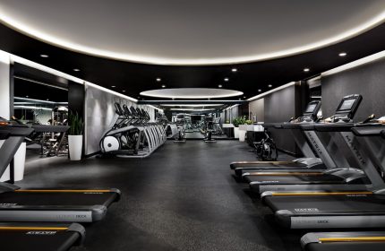 W Toronto gay-friendly hotel gym. Treadmills and elliptical machines in a modern, well-lit fitness center. Hotel gym for gay travelers.
