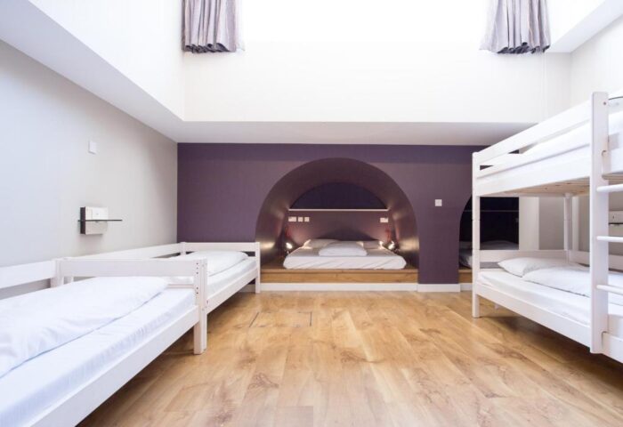 Wombats City Hostel London room. Gay-friendly hotel with bunk beds and unique alcove beds. Great for gay men travel in London.