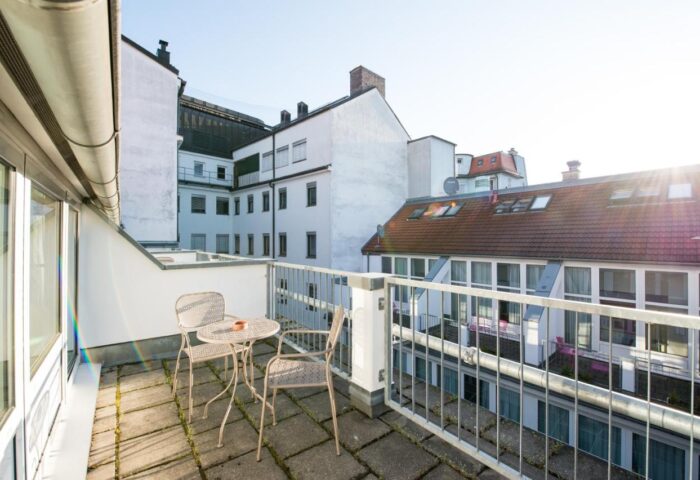 Wombats City Hostel Munich's balcony view. Gay-friendly hotel with outdoor seating. A great place to stay for gay travelers in Munich.