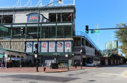 Wrigley Field exterior, home of the Chicago Cubs. Gay-friendly hotel, Wrigley Hostel Adults Only, near this iconic stadium. Baseball history.
