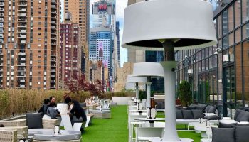 YOTEL New York Times Square rooftop lounge. Gay-friendly hotel with outdoor seating, city views, and modern design. Perfect for gay travelers.