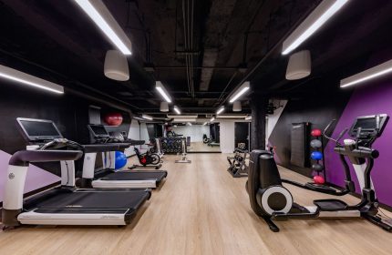 YOTEL San Francisco gay-friendly hotel gym. Treadmills, elliptical, weights, and exercise balls. Modern fitness center for gay travelers.