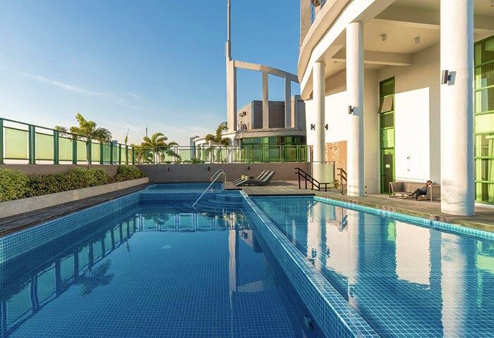 ZEN Rooms Symphony Timog Ave QC gay-friendly hotel pool. Relaxing rooftop pool view, perfect for gay travel in Quezon City, Philippines.