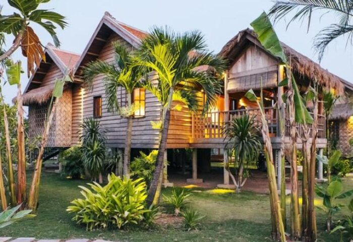 Zannier Hotels Phum Baitang: Gay-friendly hotel with wooden stilt houses, thatched roofs, and lush tropical gardens. A serene retreat for gay travelers.