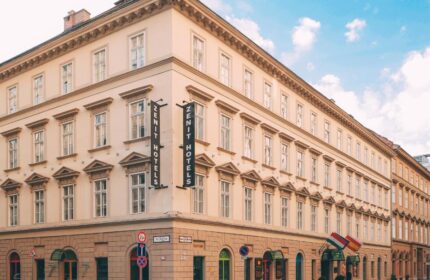 Zenit Budapest Palace, a gay-friendly hotel in Budapest. Exterior view of the hotel, showcasing its architecture and street view in Budapest.