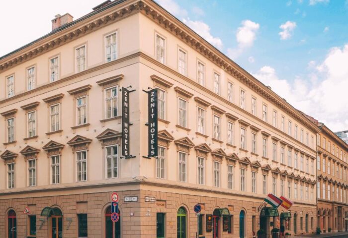 Zenit Budapest Palace, a gay-friendly hotel in Budapest. Exterior view of the hotel, showcasing its architecture and street view in Budapest.
