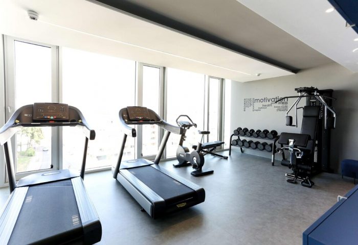 Art'otel Cologne by Park Plaza gym. Radisson hotel group's gay-friendly hotel featuring treadmills, weights, and fitness equipment.