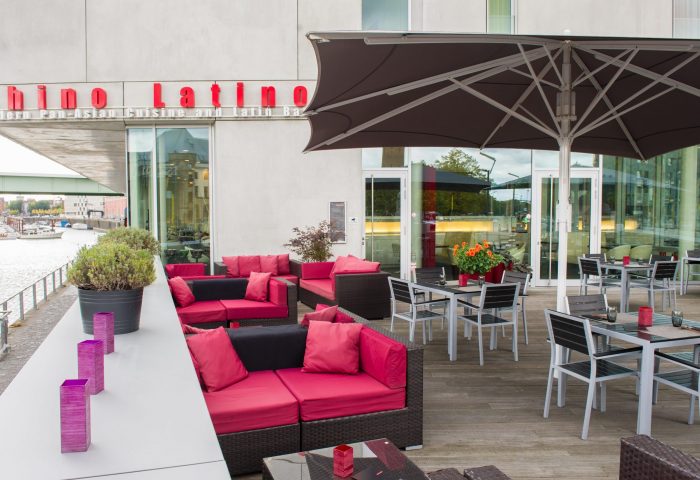 Art’otel Cologne by Park Plaza outdoor patio. Gay-friendly hotel, part of Radisson Hotel Group, with river views and modern design.