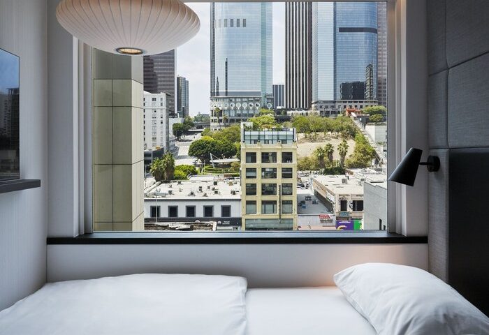 citizenM Los Angeles Downtown gay-friendly hotel room view. Modern design, skyline view, comfortable bed. Great for gay travelers.