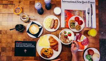 citizenM Los Angeles Downtown gay-friendly hotel breakfast. Diverse food options including vegan, vegetarian, pastries, fruit, and coffee.