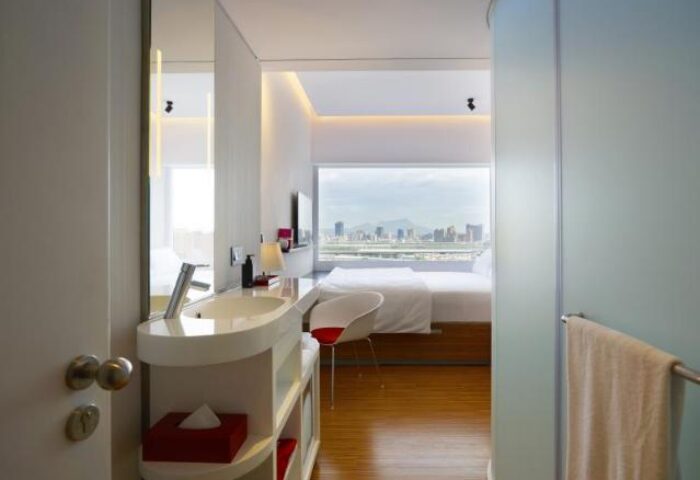 citizenM Taipei North Gate hotel room. Modern design, city view. Gay-friendly accommodation in Taipei for LGBTQ+ travelers.