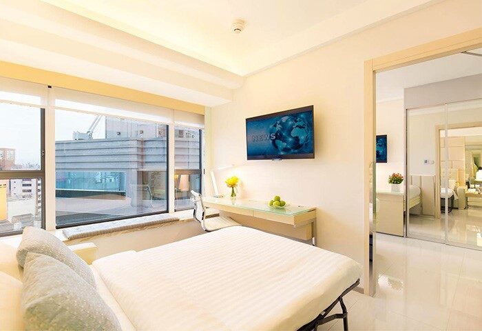 iclub Sheung Wan Hotel room. Modern, bright space with a bed, desk, and TV. A gay-friendly hotel choice in Hong Kong for gay travelers.