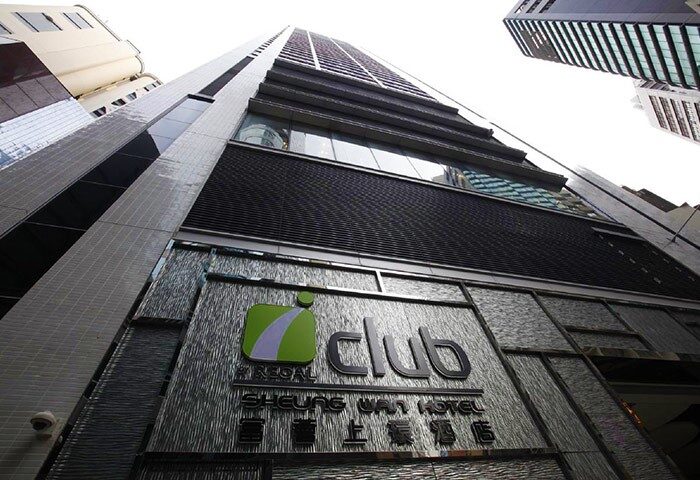 iclub Sheung Wan Hotel's exterior. Gay-friendly hotel in Hong Kong. Modern architecture with the hotel's logo and name prominently displayed.
