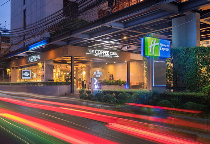 Holiday Inn Express, a gay-friendly hotel near Bangkok nightlife in Sathorn. The Coffee Club cafe is also visible.