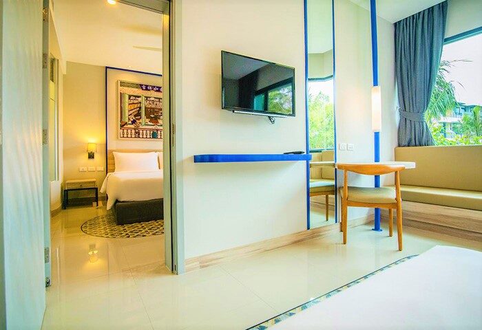 Holiday Inn Express Krabi Ao Nang Beach hotel room. Modern design, TV, desk, and view. Ideal for a gay honeymoon in Krabi, Thailand.