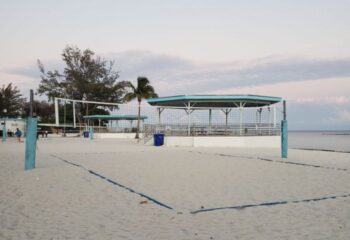 Higgs Beach in Key West. Volleyball court on the beach with covered picnic areas. Gay cruise stop in Key West, Florida.