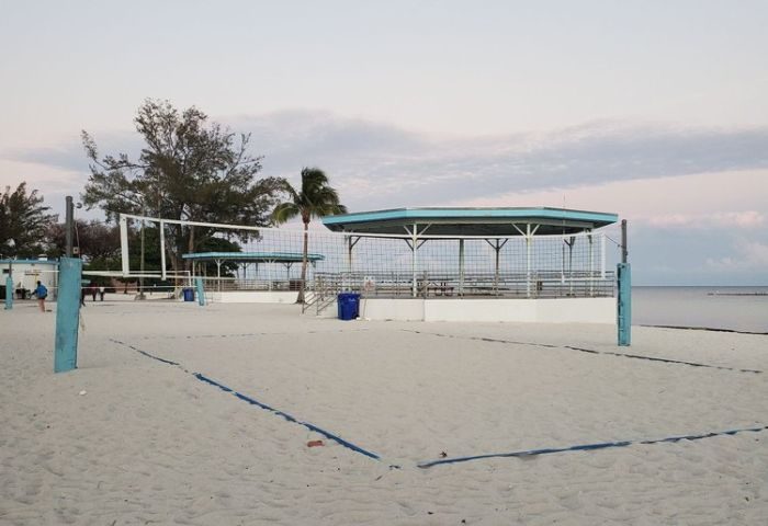 Higgs Beach in Key West. Volleyball court on the beach with covered picnic areas. Gay cruise stop in Key West, Florida.