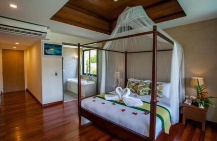 Hula Hula Resort Ao Nang honeymoon suite. Gay hotel in Krabi with swan towels on bed. Most booked cheap hotel. Romantic getaway.