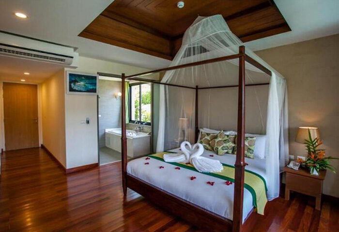 Hula Hula Resort Ao Nang honeymoon suite. Gay hotel in Krabi with swan towels on bed. Most booked cheap hotel. Romantic getaway.