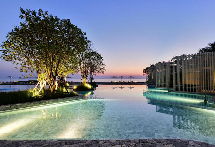 Veranda Resort Pattaya MGallery beachfront pool view at sunset. Gay-friendly hotel in Pattaya, Thailand, perfect for Instagram photos.