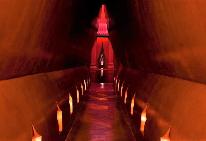 Hallway at THE BARAI, Hyatt Regency Hua Hin. Instagram-worthy, gay-friendly hotel. Red lighting, unique architecture. Travel advice.