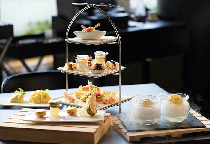 Akyra Manor Chiang Mai afternoon tea set. Luxury hotel food, desserts, & sandwiches. Instagram-worthy gay travel in Thailand.