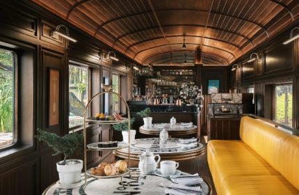 InterContinental Khao Yai Resort train carriage cafe. Top gay honeymoon hotels near Bangkok, Thailand. Luxury travel, stylish interior.