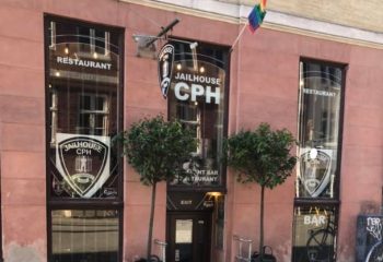 Jailhouse CPH, Copenhagen: Gay-friendly restaurant and bar, with rainbow flag. A must-visit spot for gay men traveling in Copenhagen.