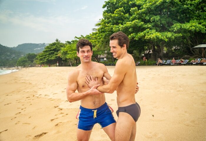 Gay couple, Jared Reinfeldt, at Vana Belle, a Luxury Collection Resort in Koh Samui, Thailand. Men on the beach. Gay travel advice.