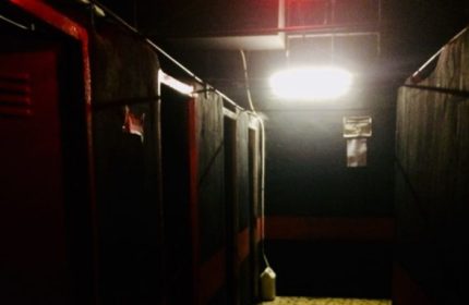 Dark corridor at K-Men Club, Rome. Lockers and private cabins. Gay travel advice for men. Nightlife spot. Interior view.
