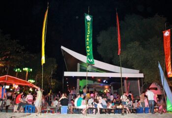 Silver Sands Koh Samet gay beach party. DJ, dancing, and drinks at the bar. Nightlife scene at this popular gay-friendly destination.