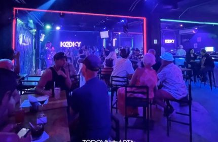 Kooky Karaoke in Puerto Vallarta: Patrons enjoy the lively gay bar with music, drinks, and a vibrant atmosphere in Zona Romantica.