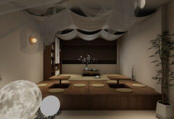 Kuma Club Las Vegas: Interior view of the gay bathhouse with a Japanese-style lounge area, low tables, and soft lighting.