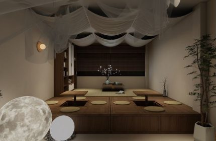 Kuma Club Las Vegas: Interior view of the gay bathhouse with a Japanese-style lounge area, low tables, and soft lighting.