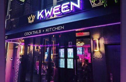 Kween Cocktails + Kitchen in Montreal. Exterior view of the gay-friendly bar with neon lights and a modern design. Travel advice.